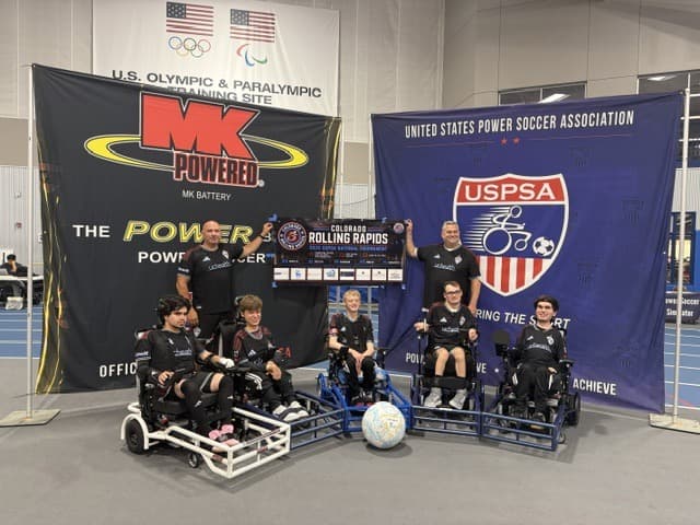 Colorado Rolling Rapids team in black UCHealth jerseys