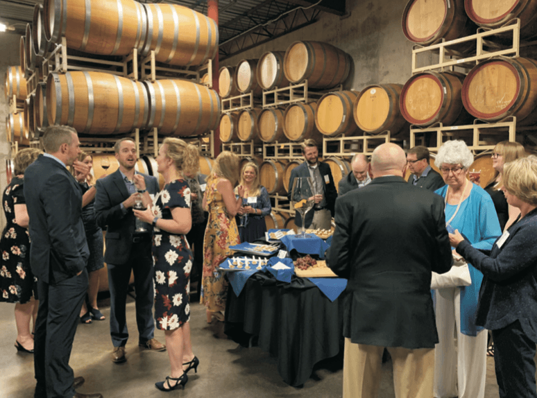 Wine cellar social gathering at Romito Foundation event